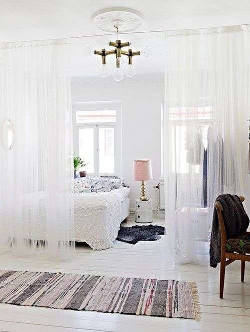 curtain partition to create bedroom in studio