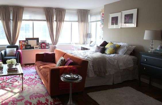 sofa divider in studio apartment bedroom