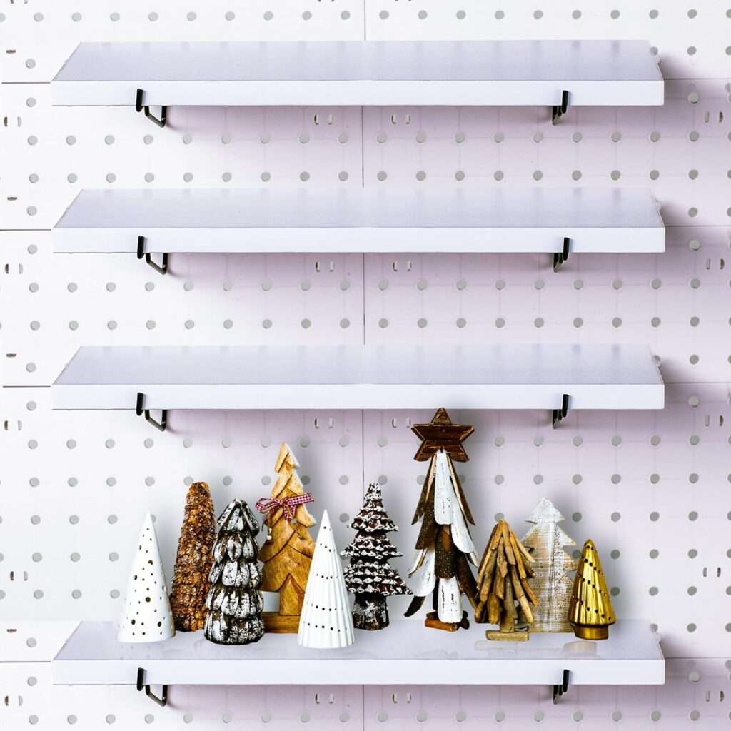 white pegboard with shelves